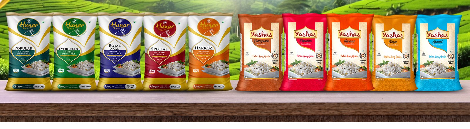 The full Hunar and Yashas Basmati rice range lined up on a wooden counter